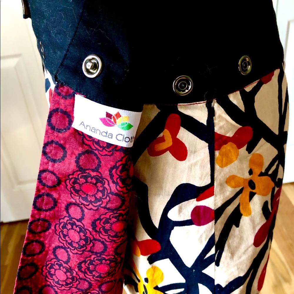 Designer Reversible Mini Skirt with snap closure.